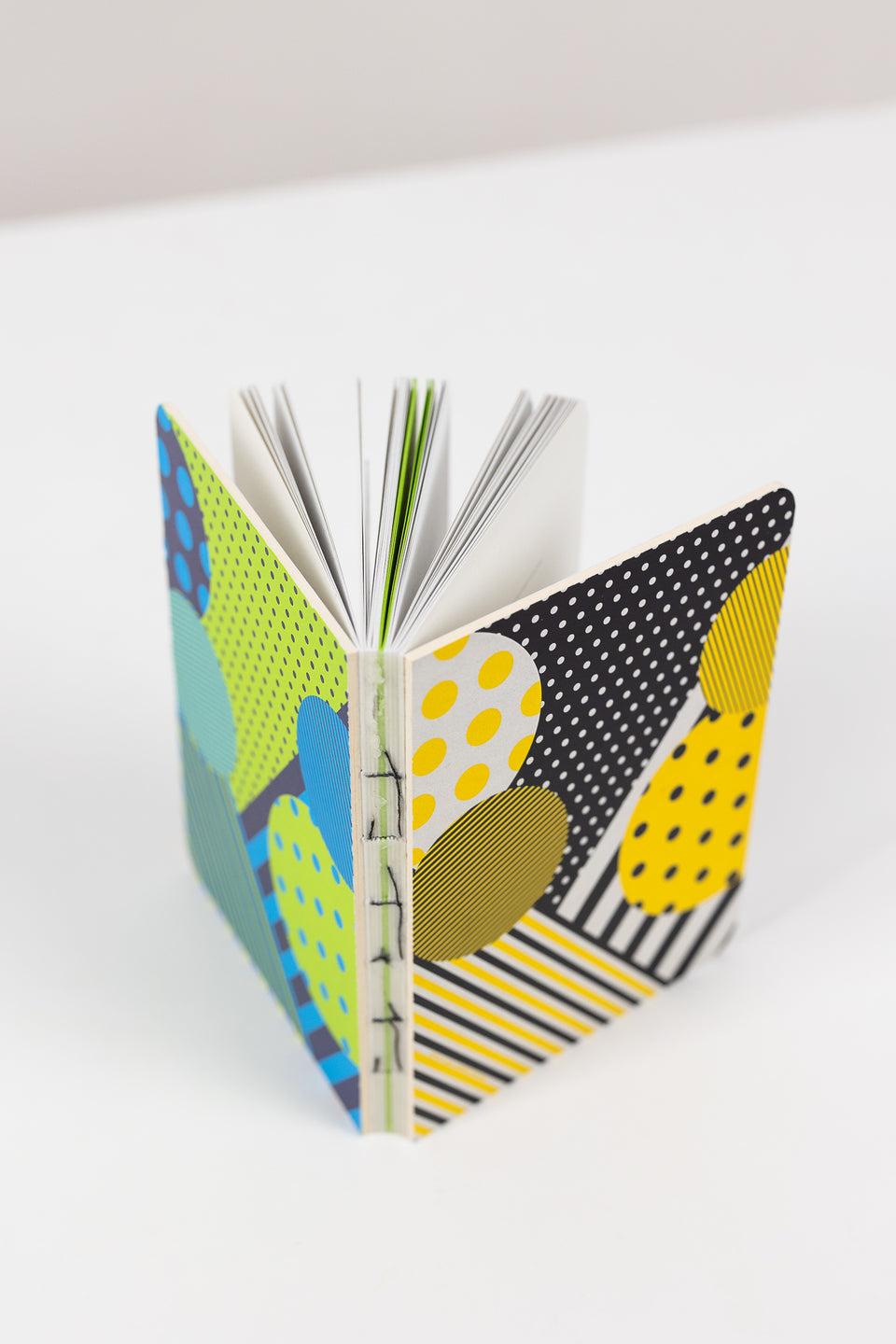 Doubleface notebook with exposed spine - A6