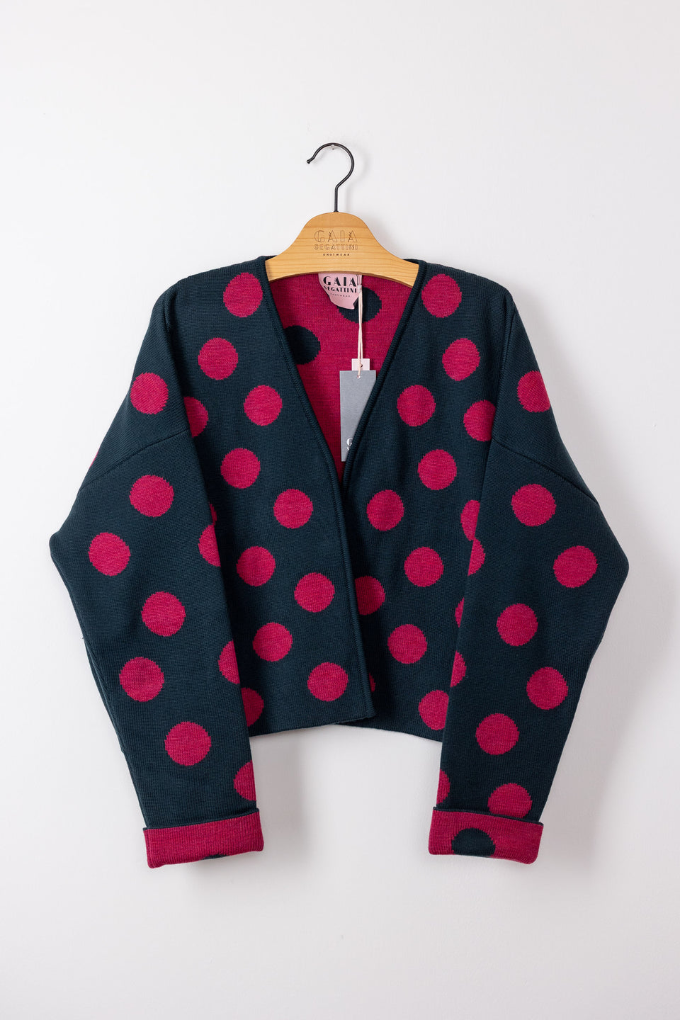 bubble cardi - bottle green with raspberry polka dots