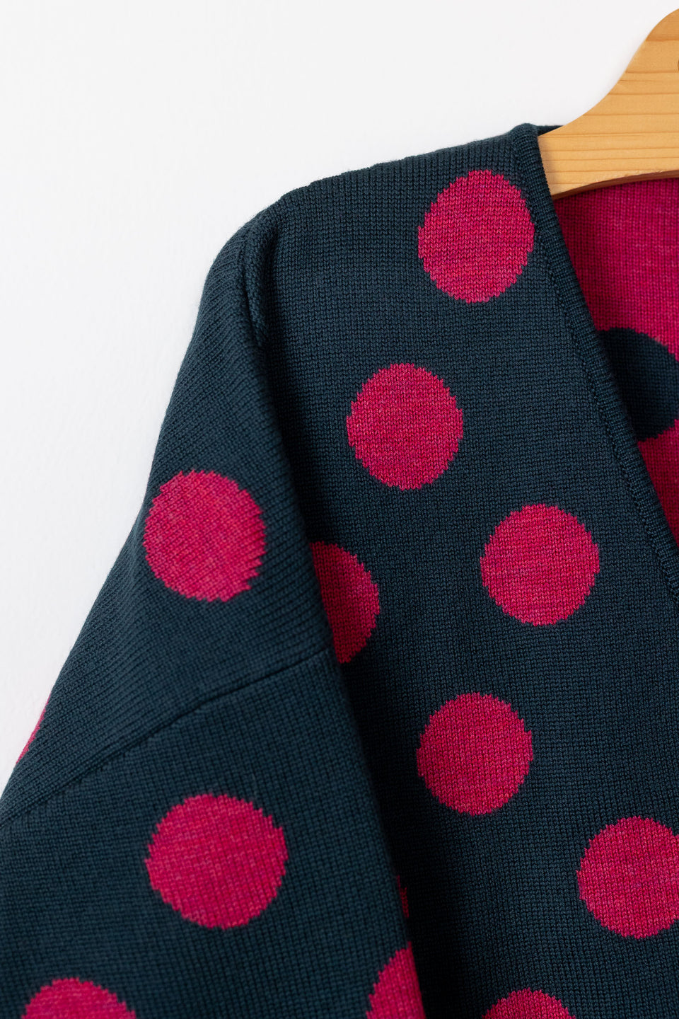 bubble cardi - bottle green with raspberry polka dots