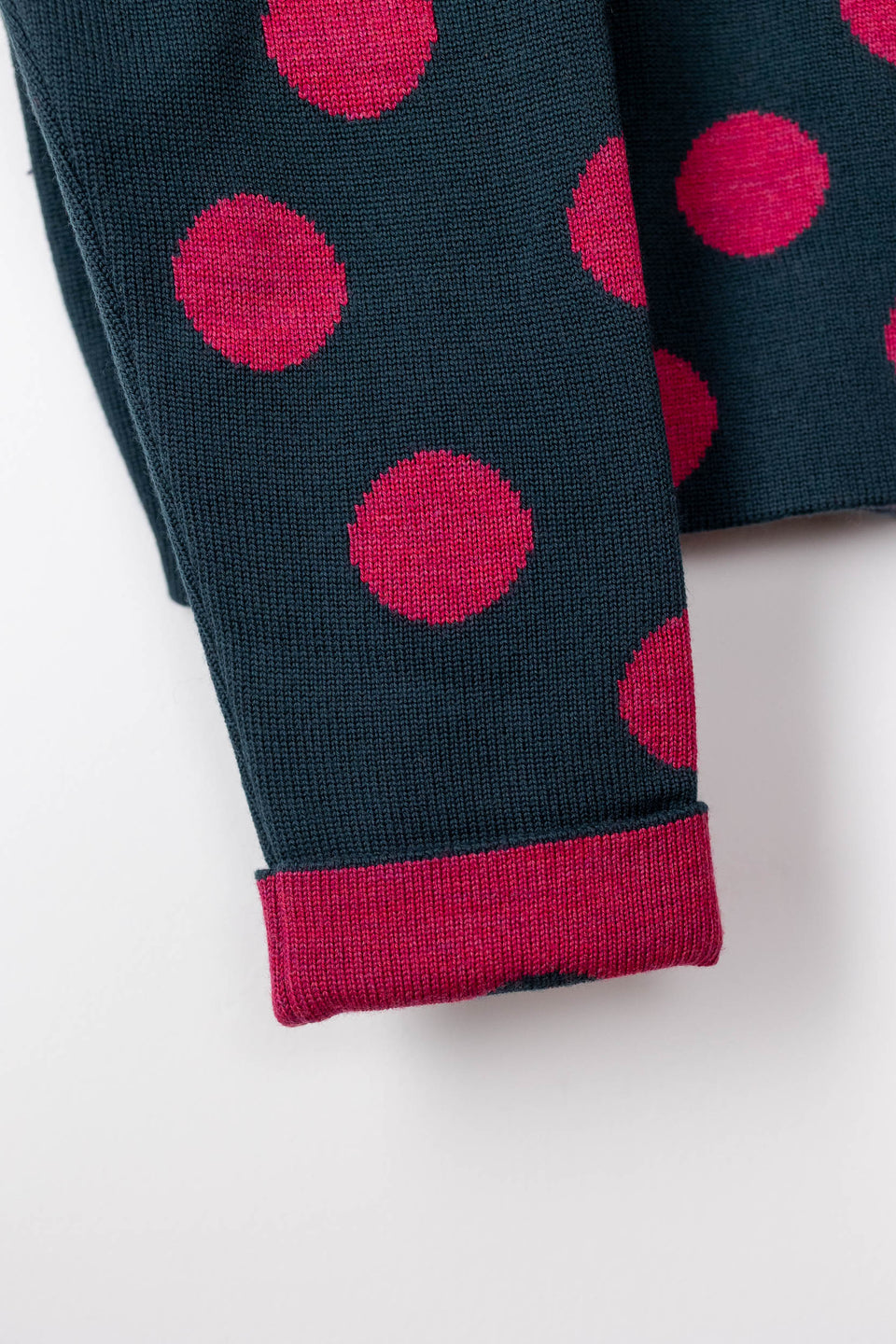 bubble cardi - bottle green with raspberry polka dots