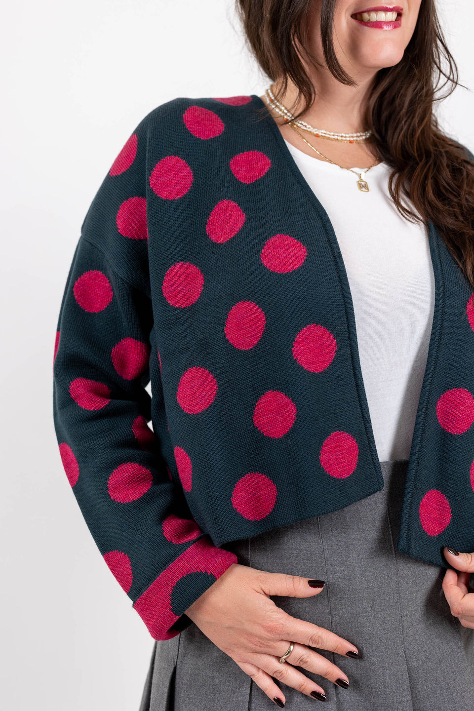 bubble cardi - bottle green with raspberry polka dots